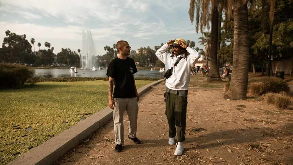Two men talking on a walk after starting treatment through Minnesota Direct Access.