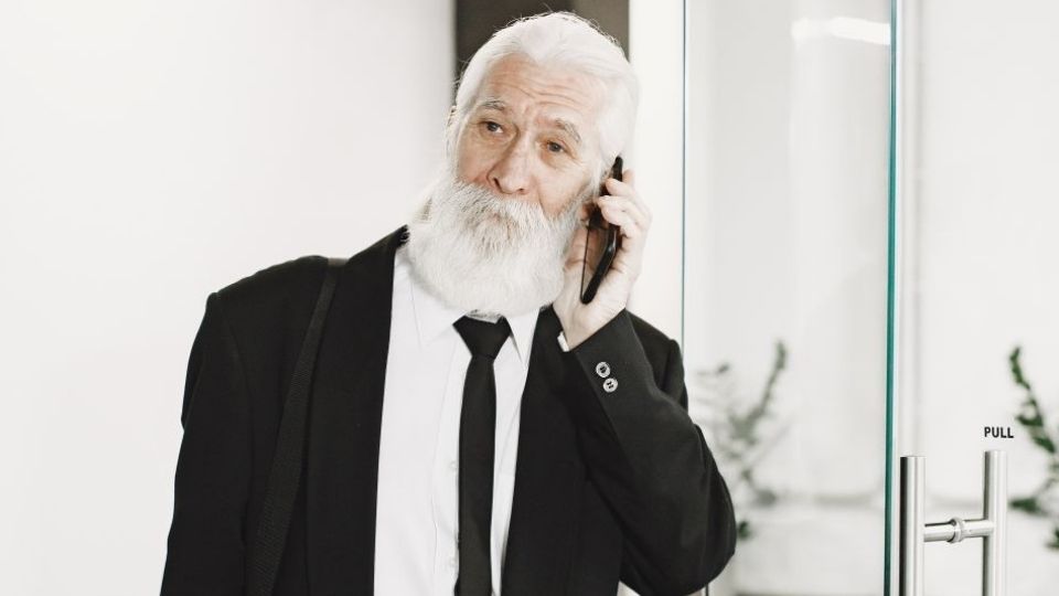 Man calling a provider after learning how to pay for rehab in Minnesota.